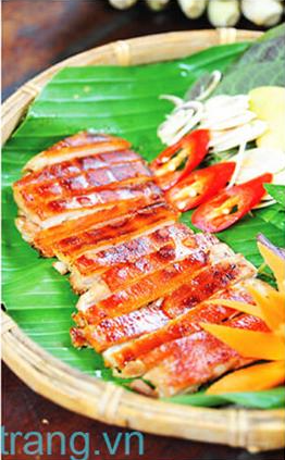 Grilled pork with crispy skin.