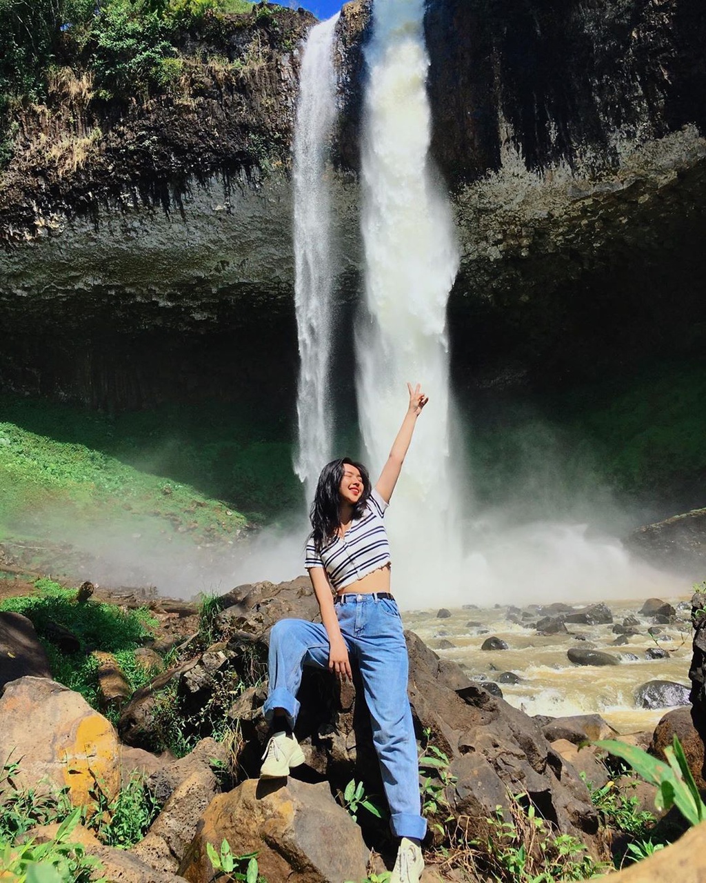 Feel free to check-in in front of the waterfall