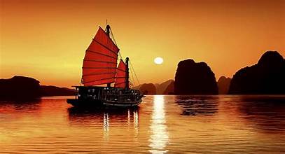 Watch the magical sunset on Ha Long Bay