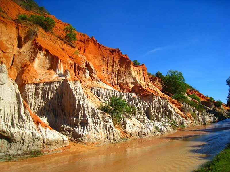 Visitors cannot help but be surprised by the bright orange-red color of the spring water